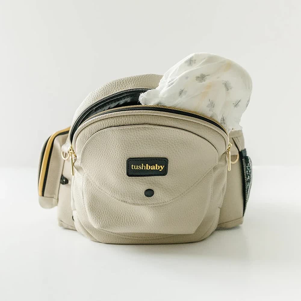 The Tushbaby™ Hip Carrier Vegan Leather Cream - NEW WITHOUT TAGS